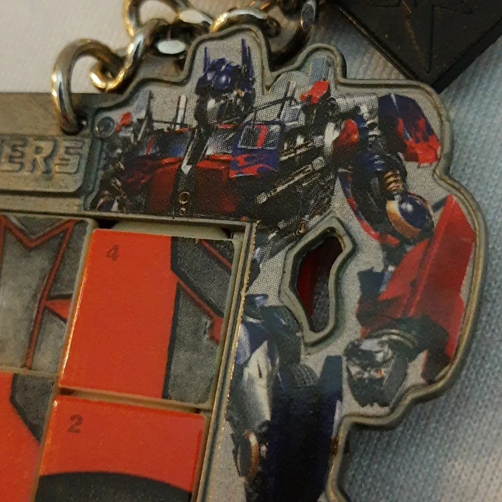 Transformers Miniature Slide Puzzle Keychain Autobot Symbol 2007